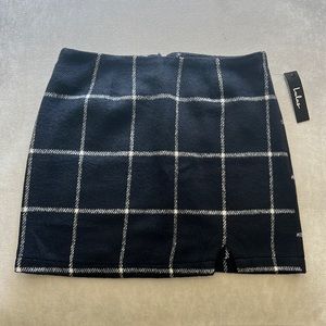 Blue plaid wool skirt, size medium, tags on, never worn